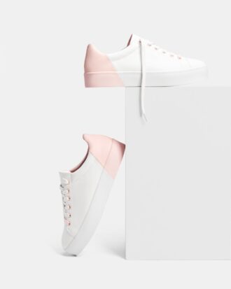 Lace-up sneakers with pink details